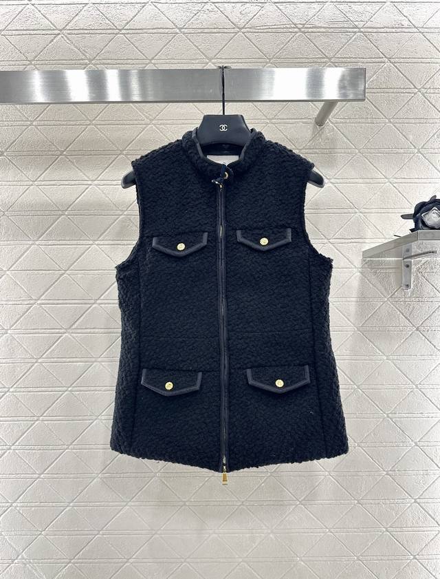 Moncle's 2025 new arrivals: woolen patchwork zippered down vest. The front and b