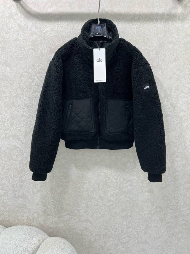 Alo*25's new Teddy plush flight jacket features diamond-quilted panels on the sl