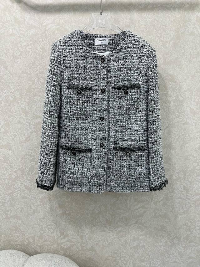 Chan*L25's new round-neck, beaded-edge jacket is made of imported wool tweed, cr