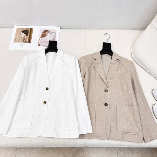 Exclusive launch of the Max 25Ss, the latest early fall minimalist linen suit.