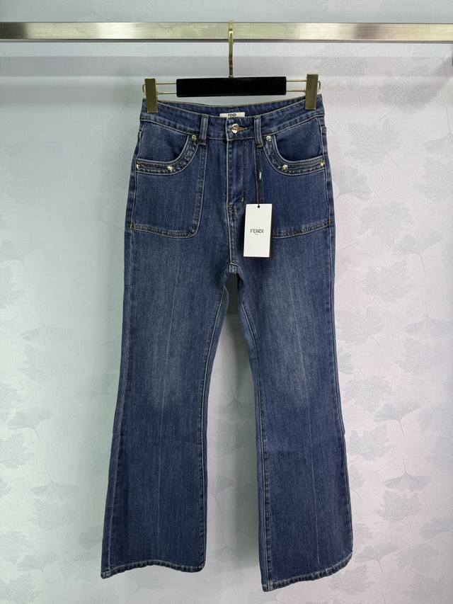 Fe** New flared jeans with embroidered logo on the back pocket. Custom-made stre