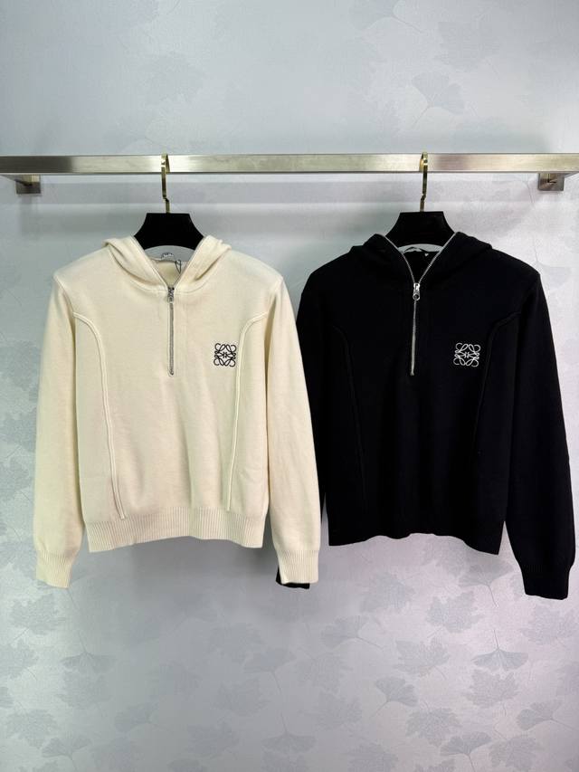 Loe*25's new early fall hooded knitted cardigan features a classic logo embroide