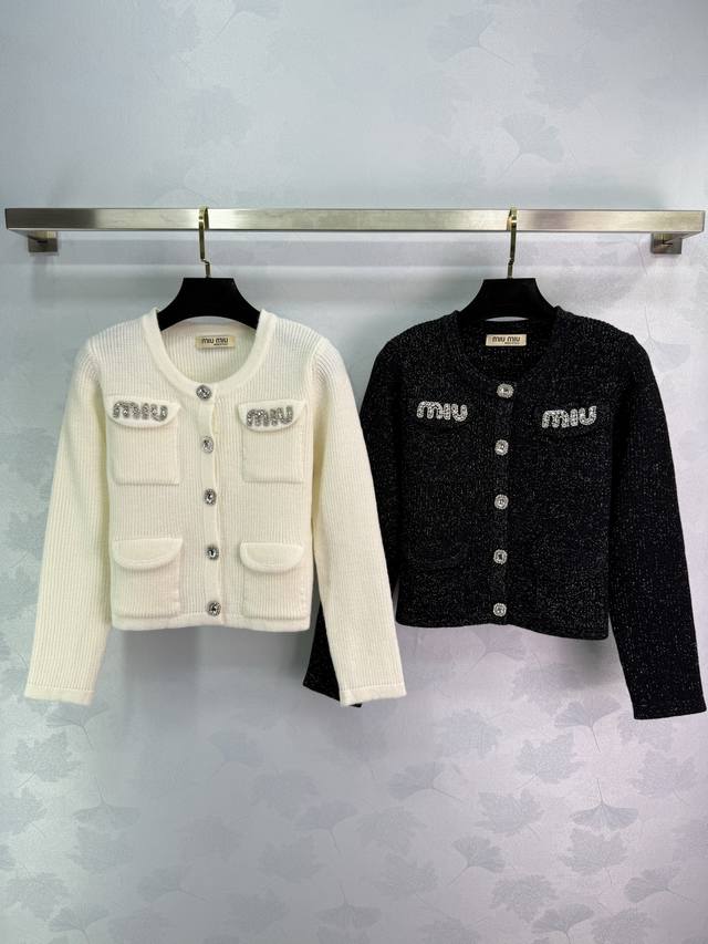 Miu*25's new early fall knitted cardigan features a rhinestone logo on the chest