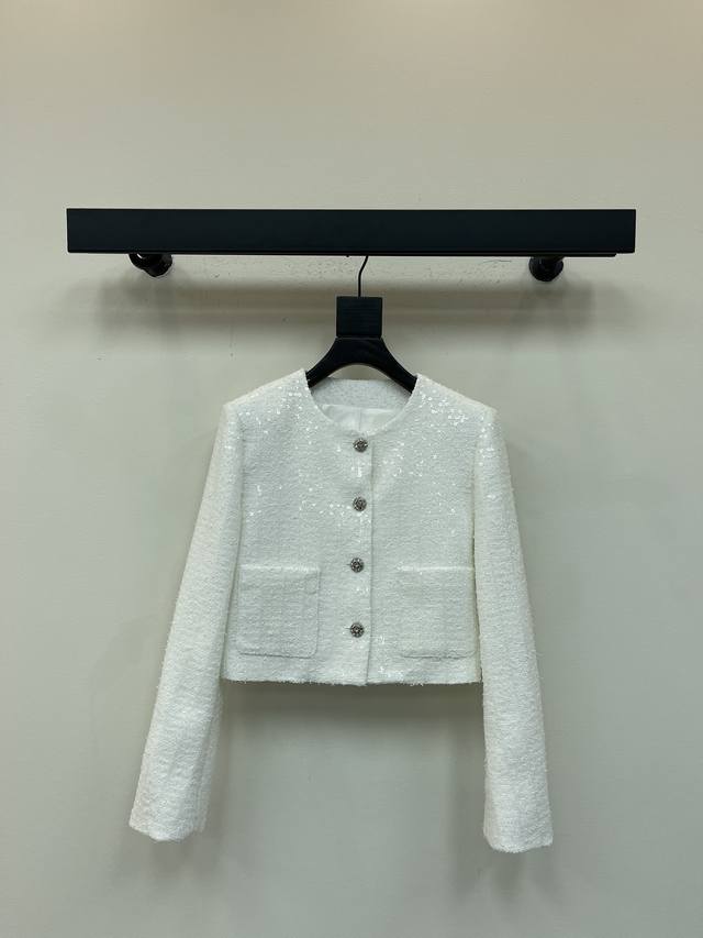 Chane*25's new premium, heavy-duty sequined tweed jacket. The white tweed woven