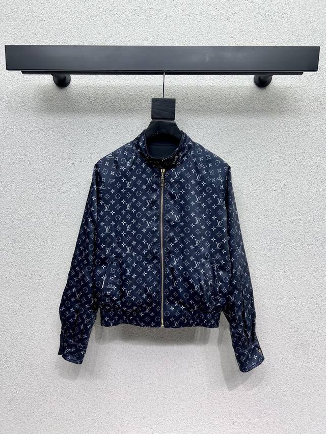 L's monogrammed double-sided jacket is smart, neat, and stylish. Recommended for