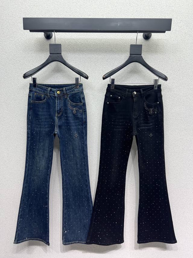 L's heavy-duty rhinestone high-waisted stretch flared jeans. High-waisted, slimm