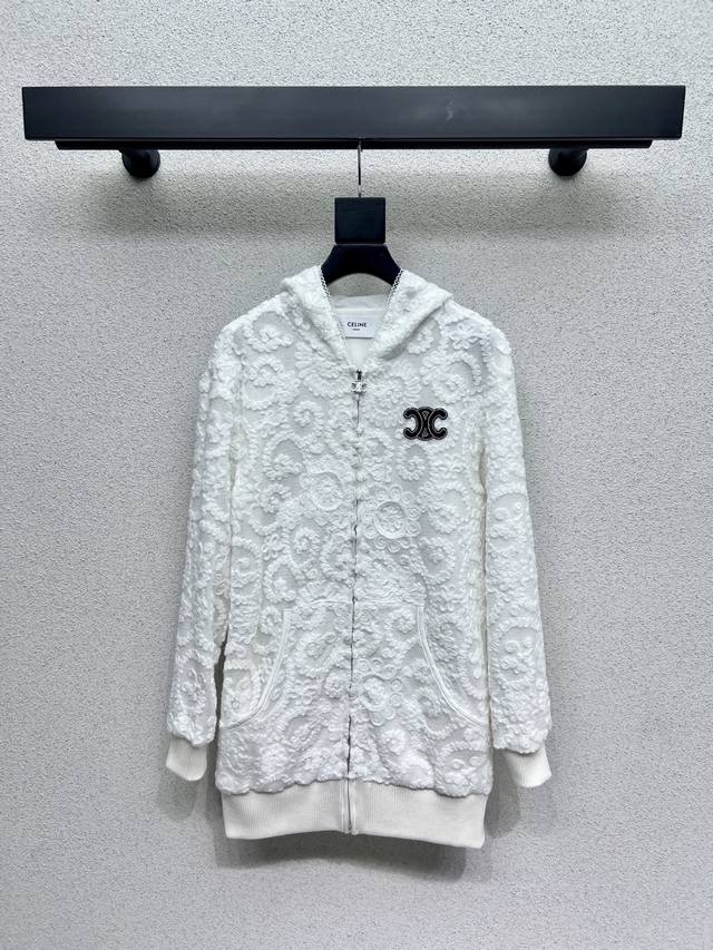 Ce* Heavily embroidered with a classic logo, this white jacket features custom m