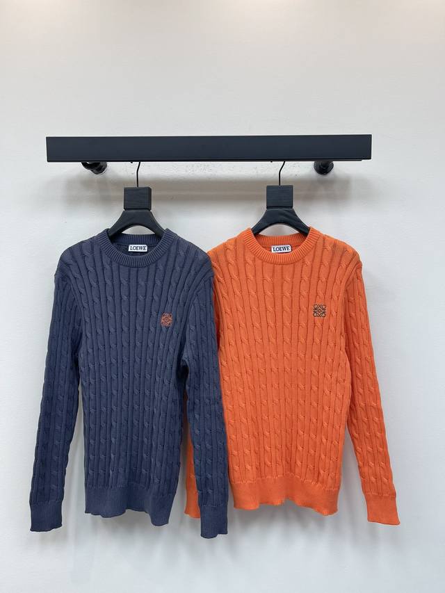 Loew*'s new fall/winter crewneck sweater with embroidered chest logo. The classi