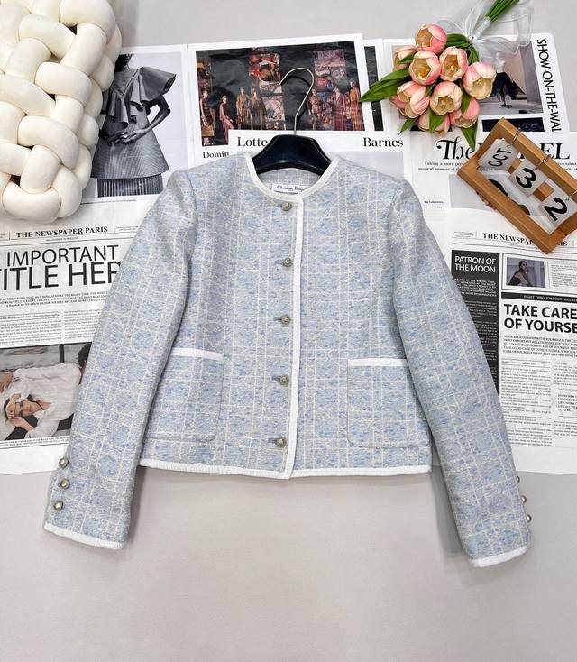 The exquisite weaving of the Dior Cruise 25 Princess Diana Cang check tweed jack