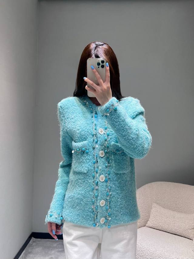 Chanel's Chan**L2025Fw Premium Vintage Collection Wool Knit Cardigan is another