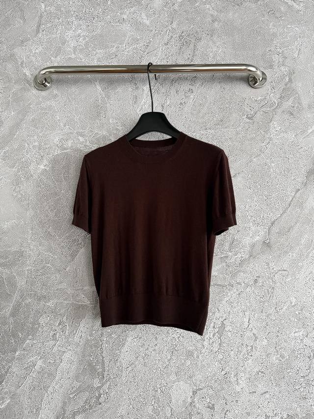 In stock, , style 60p. This chestnut brown sweater boasts a calm, restrained y