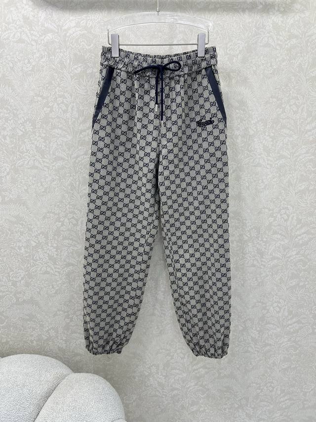 Gucc* Gucci's new Double G jacquard elastic waist cuff trousers from the 2025 co