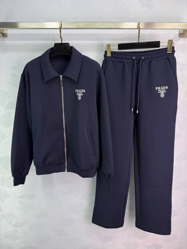 prad*25 new set, a hooded zippered jacket and slim straight-leg pants. The jacke