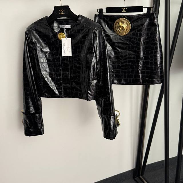 Style No. 20255786 Schiaparelli's newest suit, a crocodile-patterned long-sleev