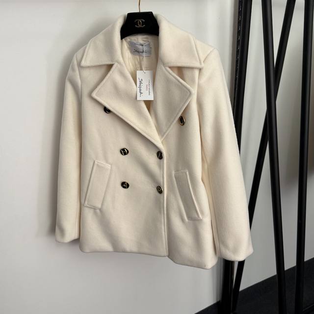 Style No. 20255762 Schiaparelli's latest custom-made long-sleeved woolen blazer
