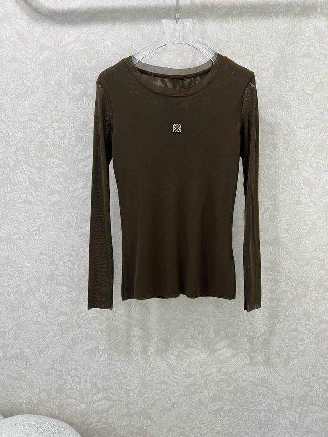 Loew*25 new mesh-trimmed round-neck top with a small metal logo on the chest. So