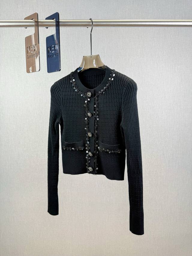 Chanel | Black Sequined Knit Cardigan. . Round neck design with sequined embel