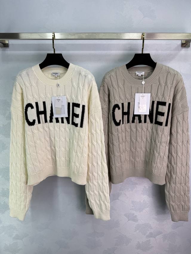 Ch*25 New early autumn cable knit sweater with black lettering on the chest. Sim