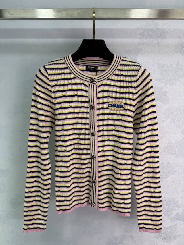 Chane striped knit cardigan. Pink, yellow, and black stripes with logo embroider