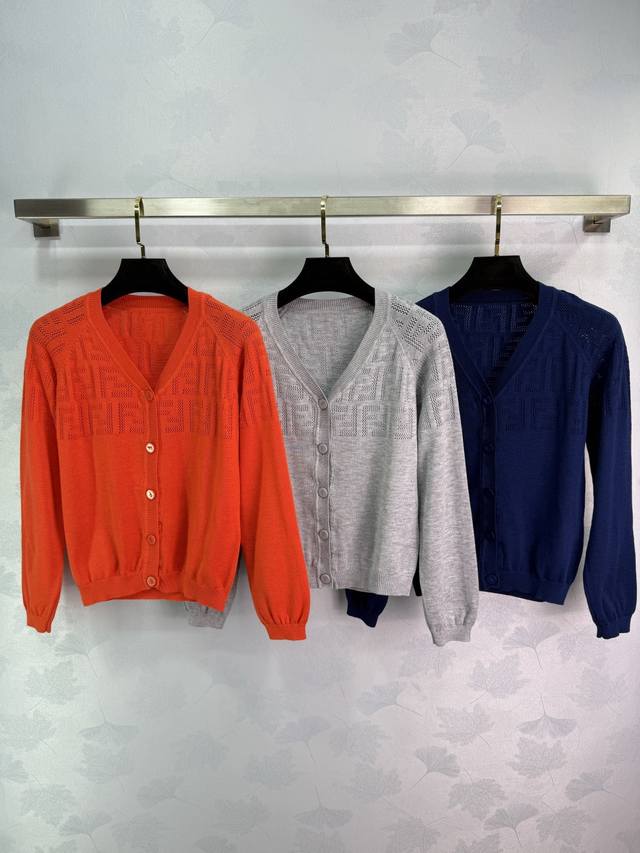 Fend*Ff lettered hollow knit cardigan. Available in three colors: orange, gray,