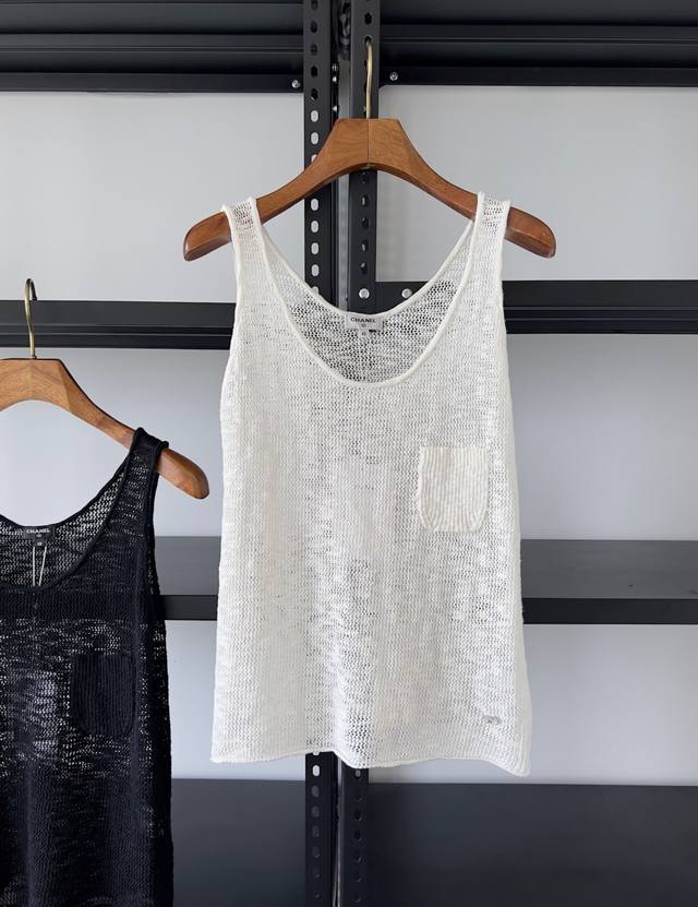 This Chanel 25M Coco Beach Collection pocket knit vest is an original design, c