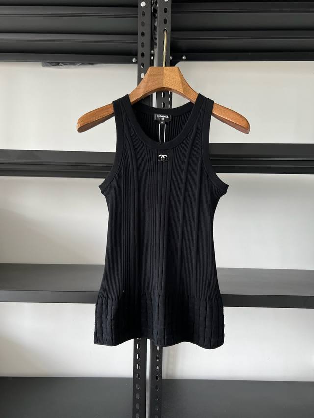 This Chanel 25 jacquard knit vest is 100% authentic and available for purchase
