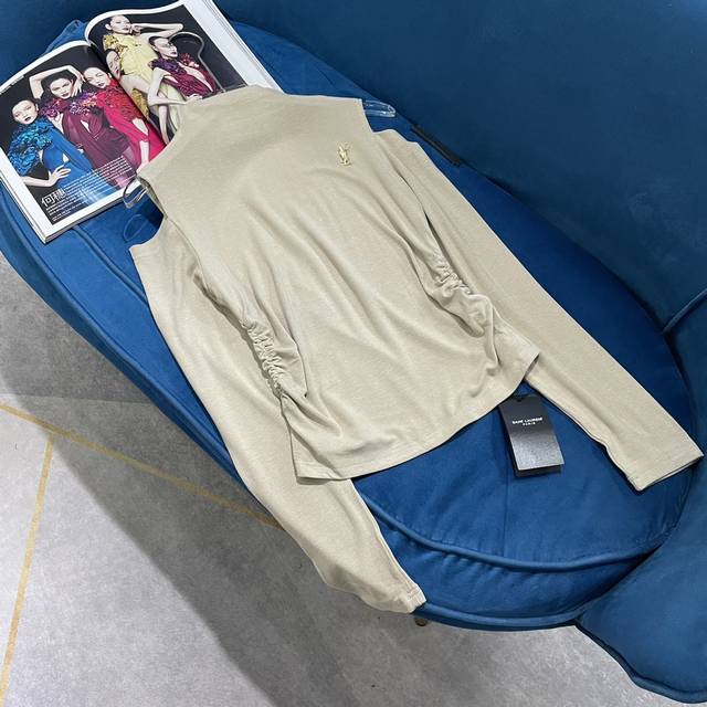Ysl's new versatile irregular long-sleeved base shirt features simple, three-dim