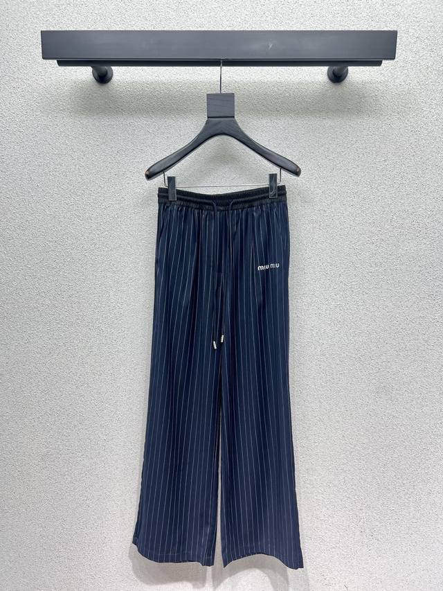 Miu's striped suit jacket and casual trousers are designed to be worn separatel