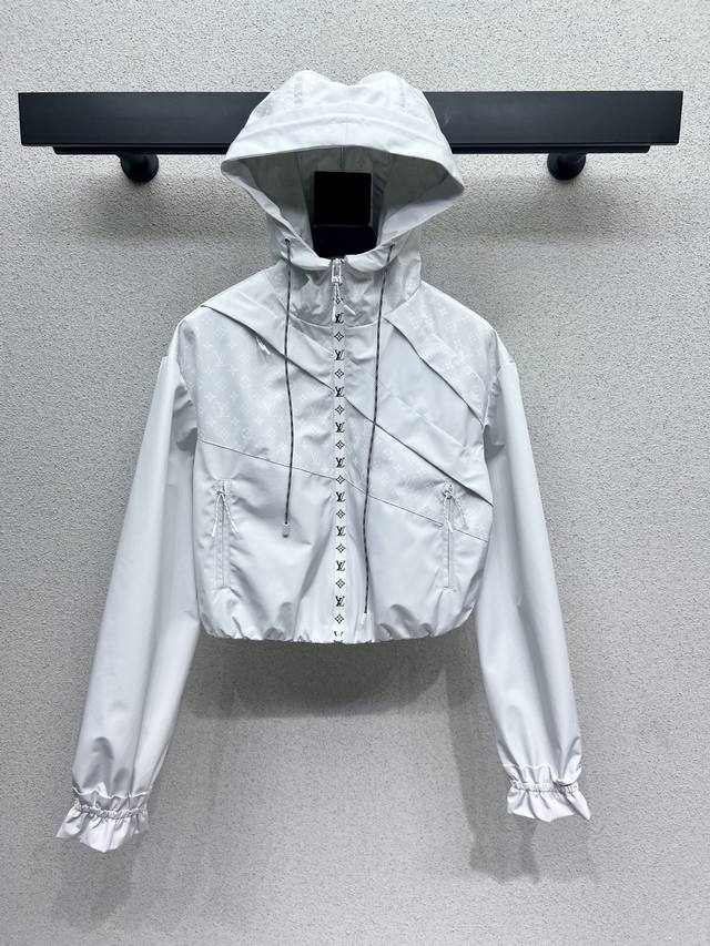 L's white monogrammed hooded jacket is made of a special material with a texture
