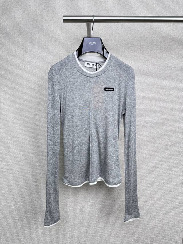 Miumiu's new fall 2025 Tencel wool fake two-piece long-sleeved top features a do