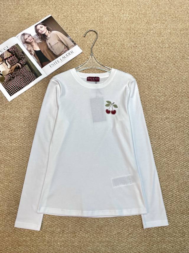 Gucci's new long-sleeve top features a classic crew neckline and is versatile. T
