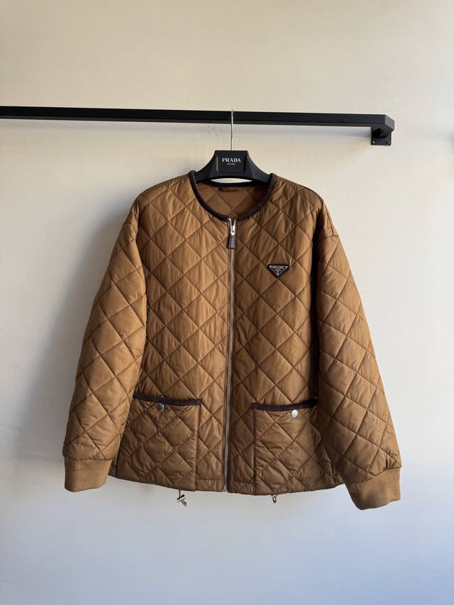 prad* New, diamond-patterned quilted jacket. This classic round-neck diamond-pat