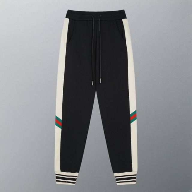 High-quality Gucci trousers with contrasting color webbing, custom ribbed black