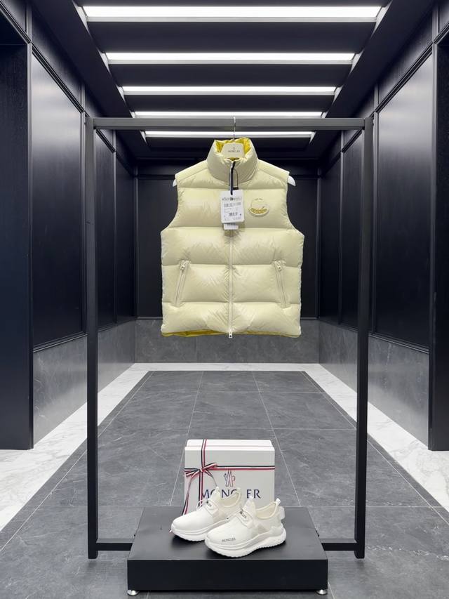 Color-blocked down vest, Moncler Lipsi down vest. Contrasting color-block design