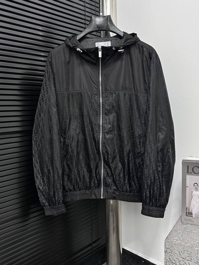 Dior Logo All-over Hooded Sweatshirt. The subtle logo print throughout highlight