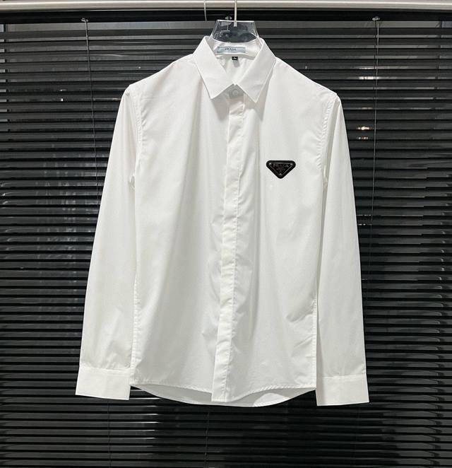 Prada Ergonomic 3D tailoring for a naturally slim fit, concealed placket, pure c