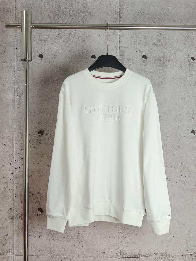 Tommy Embossed Crew Neck Sweatshirt. High-quality, all labels included, comforta