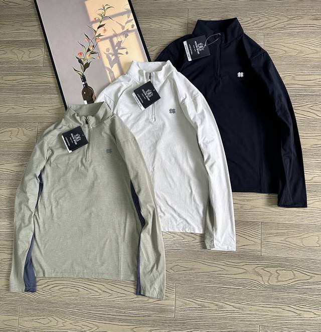 Kolon Autumn New Men's Stand Collar Half Zipper Long Sleeve Polo Shirt. The fabr