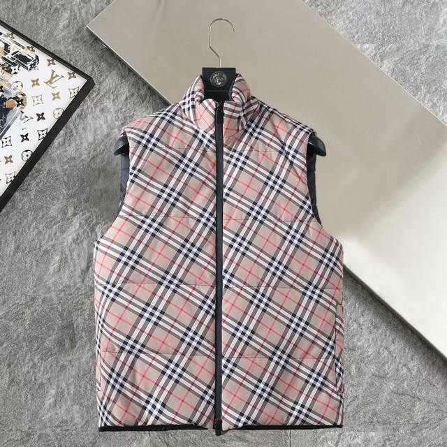 Brburberry Check Reversible Down Vest. This vest features a classic check patter