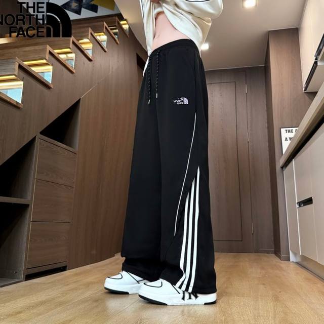 The North Face Fall New Arrival. Unisex elastic waistband, three stripes on the