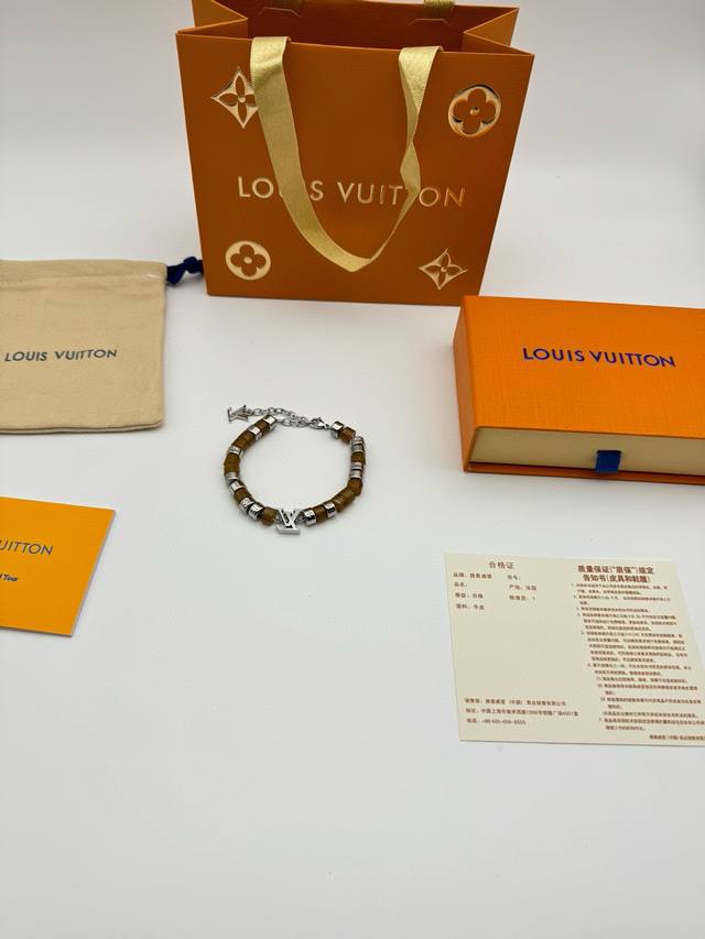 Louis Vuitton Brown Beaded Bracelet with Full Packaging. The Louis Vuitton Parad
