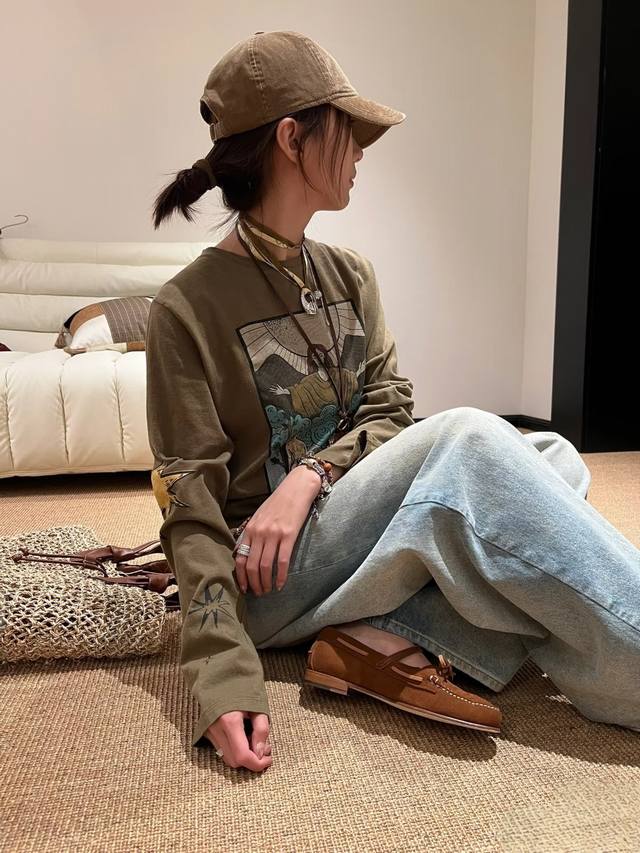 Pair it with wide-leg pants for a tall and relaxed look, or with a denim mini sk