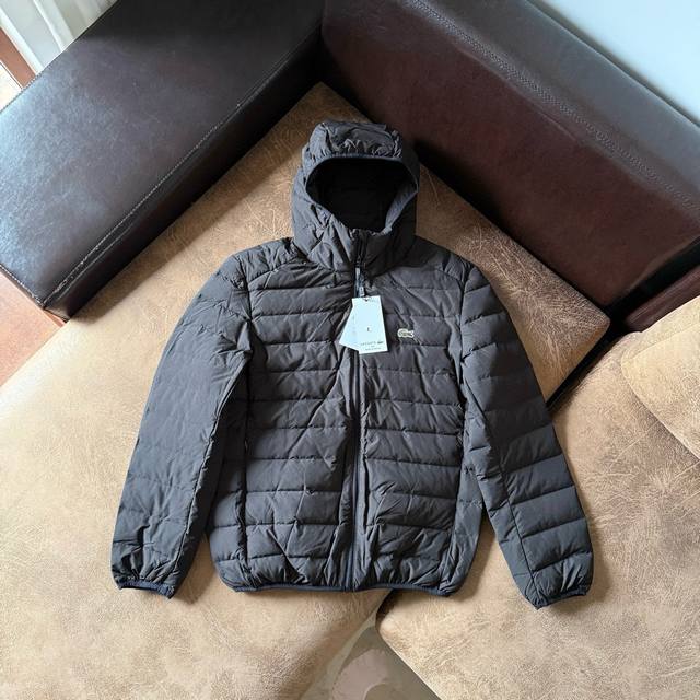 Lightweight yet warm Lacoste men's casual and stylish short hooded down jacket.