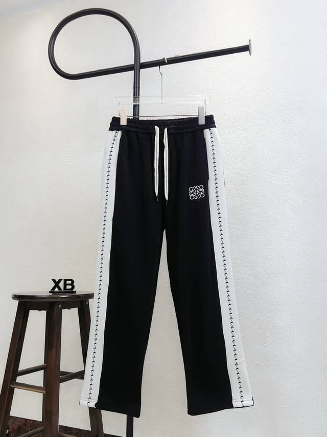 Style No. Xb135 Black Loewe logo embroidered side webbing straight leg trousers.