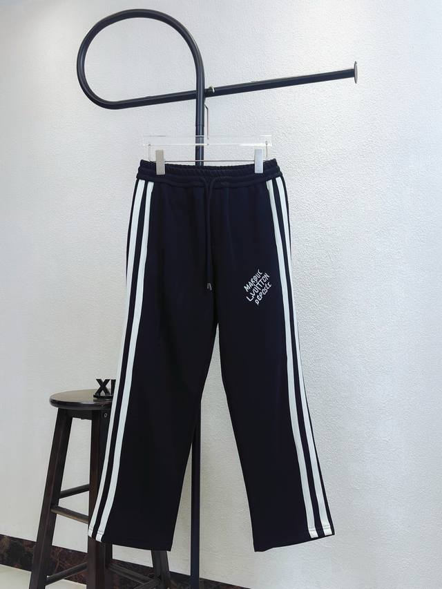 Style No. Xb139 Black Louis Vuitton trousers with embroidered logo, lettering, a