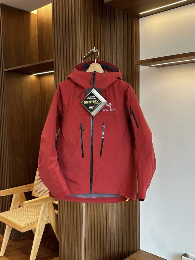 Bordeaux Red Arc'teryx Alpha SV 7 3-in-1 Hardshell Down Jacket. This two-piece d