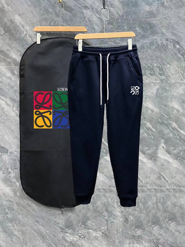 Loewe Ss runway slim-fit track pants with exquisite print and minimalist logo. M