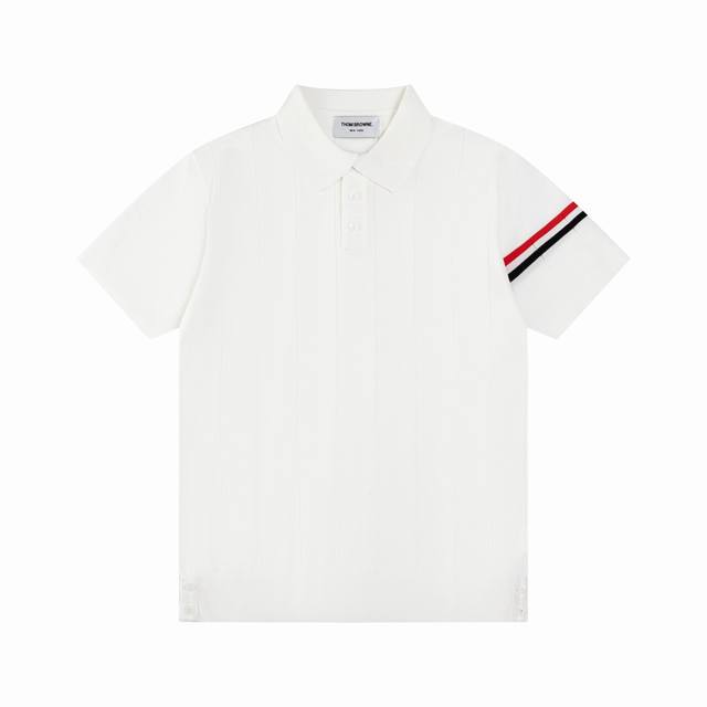 Thom Browne This classic four-stripe Tb style is a timeless piece that you'll we