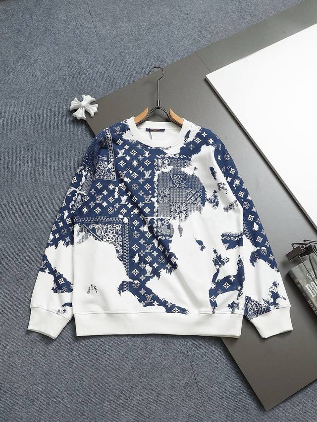 Louis Vuitton's classic splatter paint technique and upgraded logo are inspired