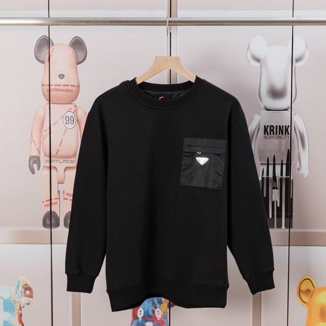 Prada Crew Neck Pocket Triangle Label Sweatshirt. Made of comfortable and soft f